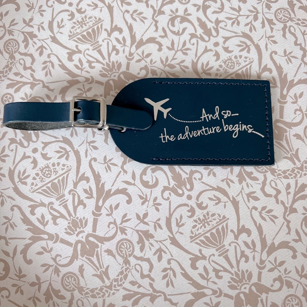 Navy blue leather lugguge tag .. and so the adventure begins. Unused
